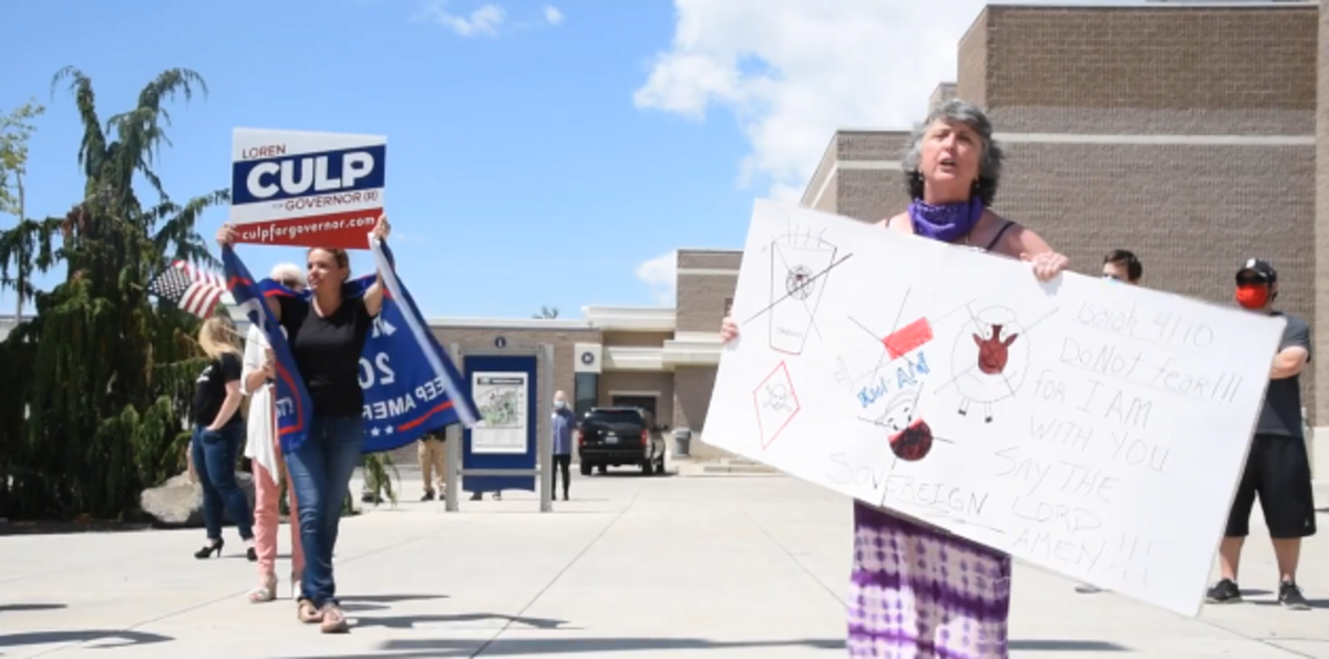Protesters show up to Gov. Jay Inslee’s briefing on the coronavirus in Tri-City, Washington