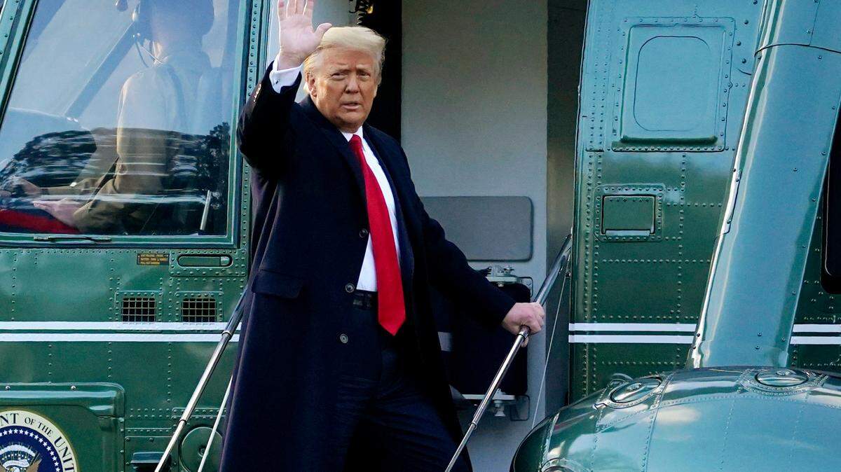 FILE - In this Wednesday, Jan. 20, 2021, file photo, President Donald Trump waves as he boards Marine One on the South Lawn of the White House, in Washington, en route to his Mar-a-Lago Florida Resort. Former President Trump has named two lawyers to his impeachment defense team, one day after it was revealed that the former president had parted ways with an earlier set of attorneys. (AP Photo/Alex Brandon, File)