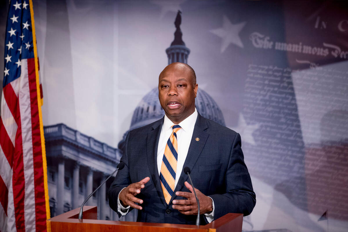 Sen. Tim Scott, R-S.C., speaks about the coronavirus relief bill at a news conference on Capitol Hill in Washington, Wednesday, March 25, 2020. (AP Photo/Andrew Harnik)