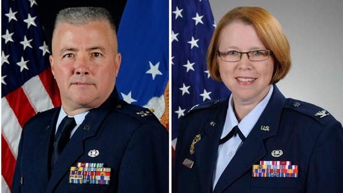 At left, Air Force Col. Vance H. Spath, the retiring USS Cole case judge, and at right Air Force Col. Shelly W. Schools, who has been appointed to replace him.