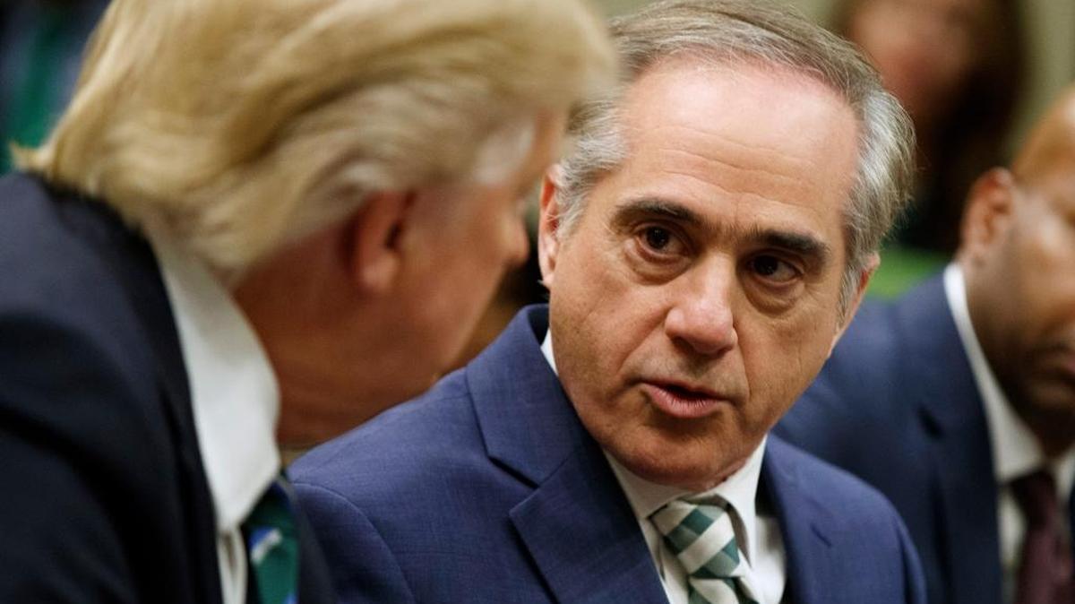 Veteran Affairs Secretary David Shulkin speaks to President Donald Trump during a meeting about veterans affairs, Friday, March 17, 2017, in the Roosevelt Room of the White House in Washington.