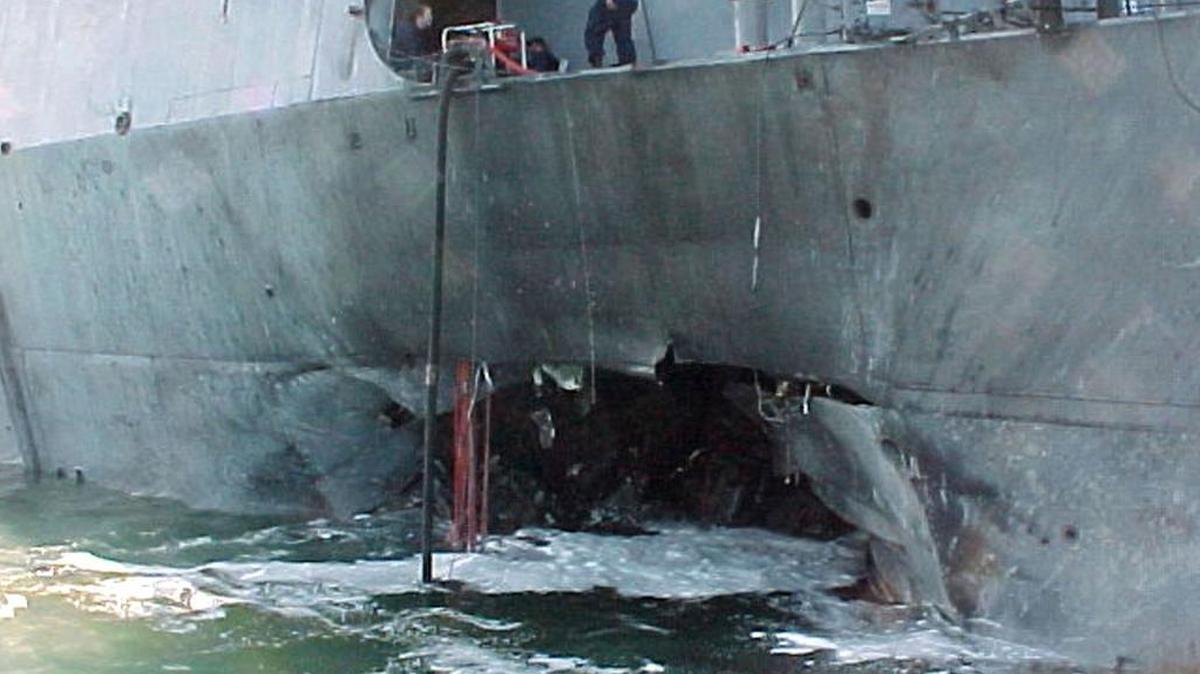The U.S. Navy released this view of damage sustained on the port side of the Arleigh Burke class guided missile destroyer USS Cole after a suspected terrorist bomb exploded during a refueling operation in the port of Aden, Yemen, on Oct. 12, 2000.