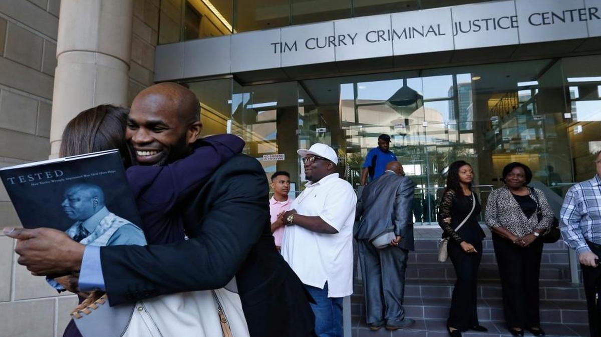 Attorney Nina Morrision gets a hug from John Nolley after the hearing outside of the courthouse in Fort Worth, Texas, on May 17, 2016. In Judge Louis Sturns' 213th District Court, John Nolley, from Bedford, was released from custody after 19 years behind bars, in Fort Worth, due to efforts by The Innocence Project. Nolley had been found guilty of murder in 1998.