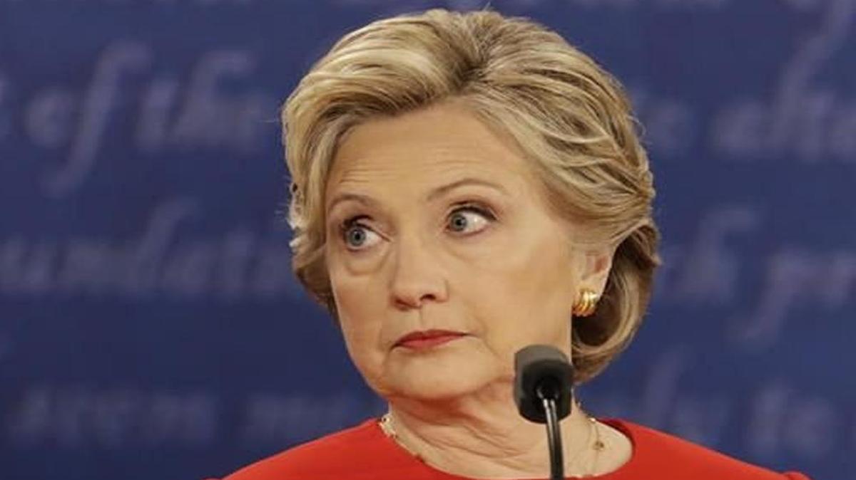 In this Sept. 26, 2016, file photo, Democratic presidential nominee Hillary Clinton listens to Republican presidential nominee Donald Trump during the U.S. presidential debate at Hofstra University in Hempstead, N.Y.
