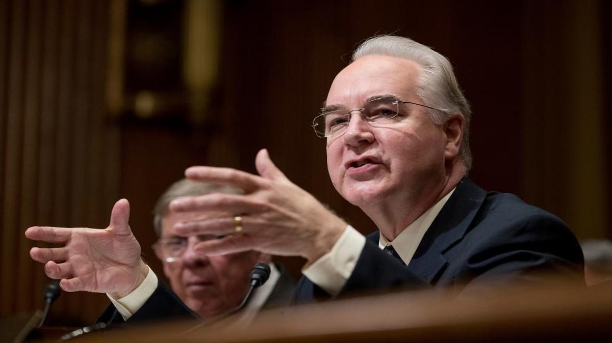 Health and Human Services Secretary-to-be Tom Price, right, accompanied by Sen. Johnny Isakson, R-Ga., testifies on Capitol Hill in Washington on Jan. 24, 2017, at his confirmation hearing before the Senate Finance Committee.