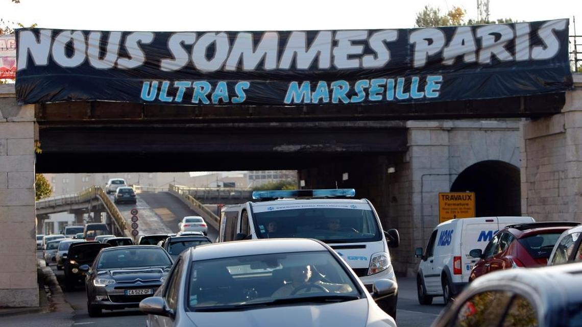 A banner reading "We are Paris" in Marseille, France, Monday.