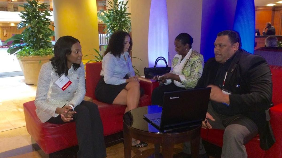 
Dr. Tashni-Ann Dubroy, president of Shaw University and Historically Black Colleges and Universities All-Star student Bryann Guyton, also from Shaw, discuss potential partnerships with Michelle Anthony and Sean Heileman, both heads of companies at the 2015 HBCU conference on Sept. 22, 2015 in Washington D.C. The conference brought together hundreds of students, administrators and others to discuss the future of the schools.
