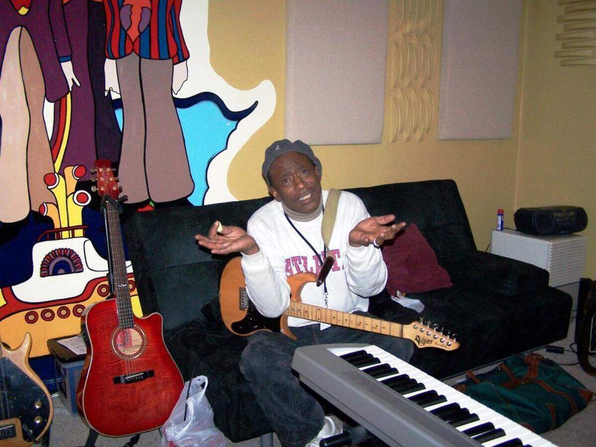 This photo taken at Big Sound Productions ATL in Atlanta shows Ron Laster, longtime guitar player for the late James Brown, during a break from recording. Facing a health problem, Laster borrowed money against his car title, he said, only to fall into a debt trap.