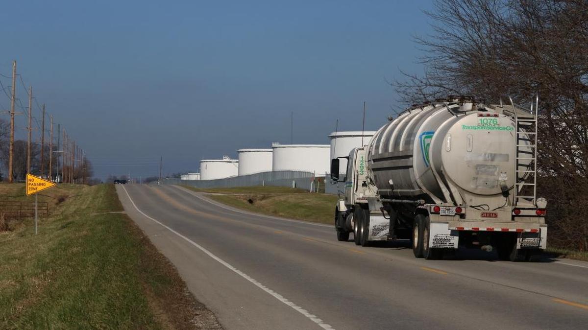 A tanker truck passes the oil storage tanks at Patoka, Illinois, in December 2015. The small town in southern Illinois would be the southern terminus of the Dakota Access Pipeline, if it is completed.