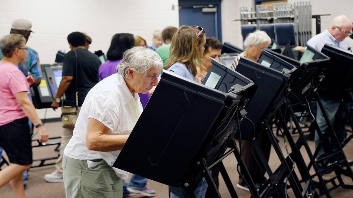 Voters fill the stations as hundreds came out on the first day of early voting at the Hope Mills Recreation Center in Hope Mills, NC on Oct. 20, 2016.