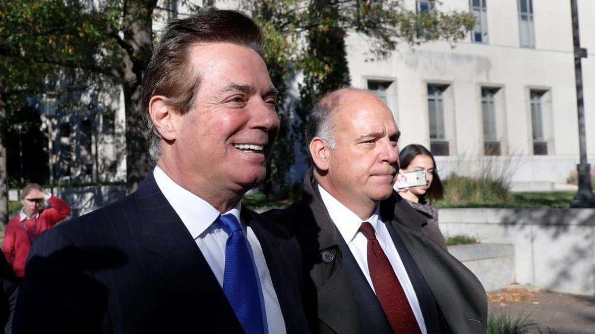 Paul Manafort, left, who chaired Donald Trump’s presidential campaign briefly in the summer of 2016, leaves U.S. District Court in Washington on Monday, Oct. 30, 2017. Manafort and his business associate, Rick Gates, pleaded not guilty to a dozen felony counts including conspiracy and money-laundering after surrendering to authorities earlier in the day.