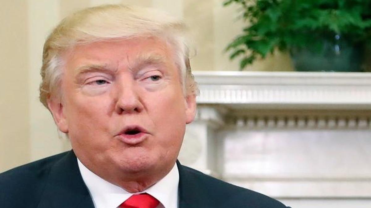 In this Thursday, Nov. 10, 2016, file photo, President-elect Donald Trump speaks during his meeting with President Barack Obama in the Oval Office of the White House in Washington.