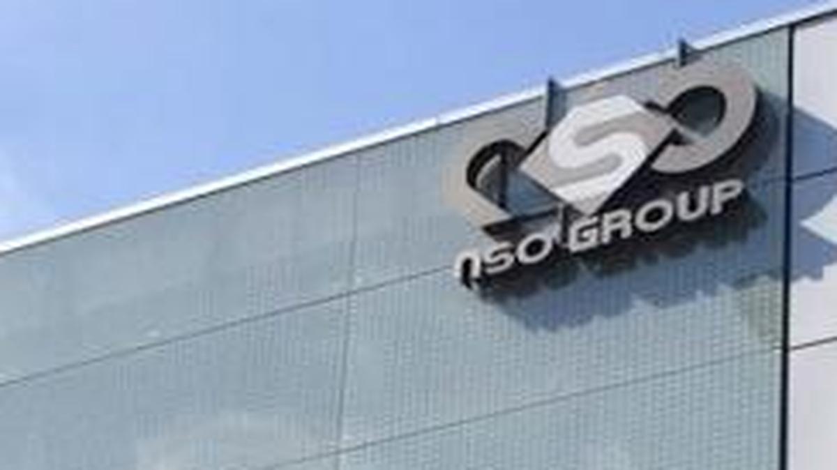 The logo of the Israeli NSO Group company is still displayed Thursday, Aug. 25, 2016, on a building where it had offices until a few months ago in Herzliya, Israel. The company’s software has been linked to attempted hacks of iPhones in the United Arab Emirates and Mexico.