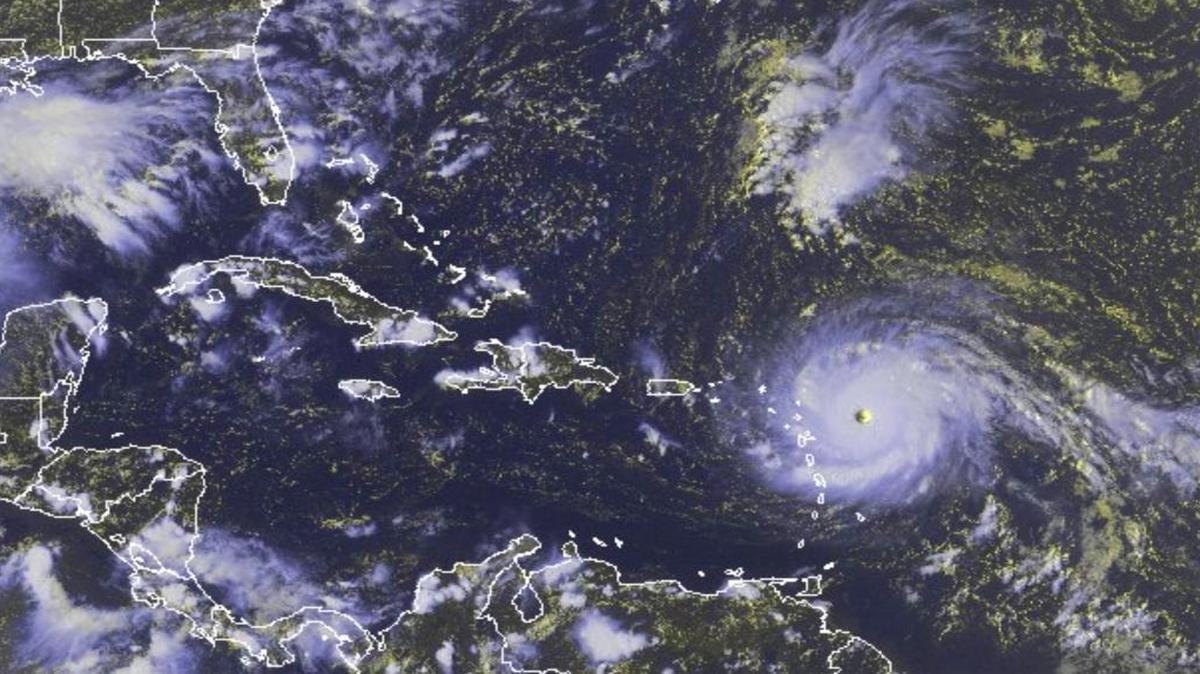 Hurricane Irma, a potentially catastrophic Category 5 hurricane, is shown in this GOES-East satellite image taken Tuesday and released by the National Oceanic and Atmospheric Administration.