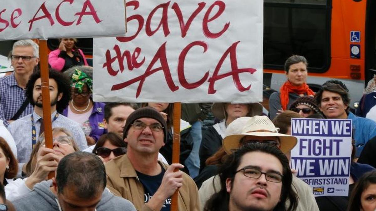 Californians join health care workers at a January rally to save the Affordable Care Act in Los Angeles. The Republican-controlled House of Representatives passed legislation to dismantle the ACA on Thursday, but the GOP claims its bill protects people with pre-existing medical conditions.