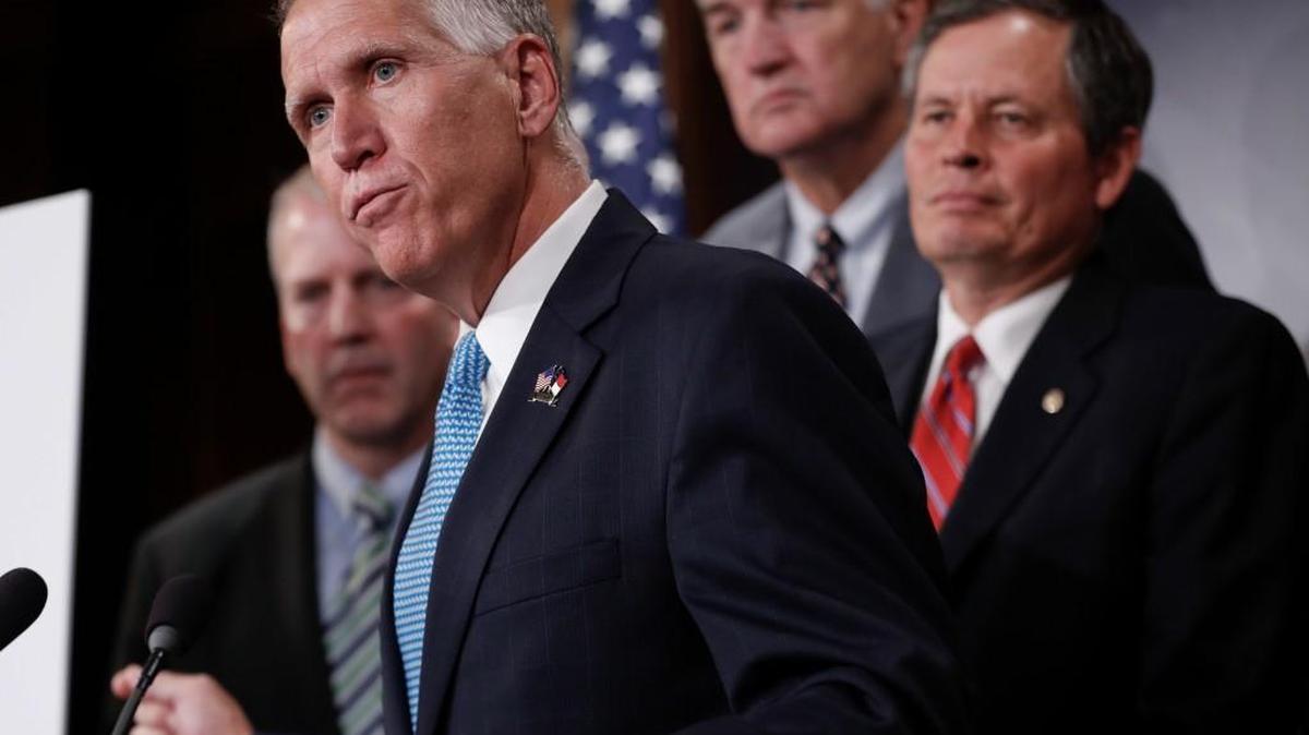 FILE - In this July 11, 2017 file photo, Sen. Thom Tillis, R-N.C., center, with, from left, Sen. Dan Sullivan, R-Alaska, Sen. Luther Strange, R-Ala., and Sen. Steve Daines, R-Mont., speaks during a news conference on Capitol Hill in Washington.