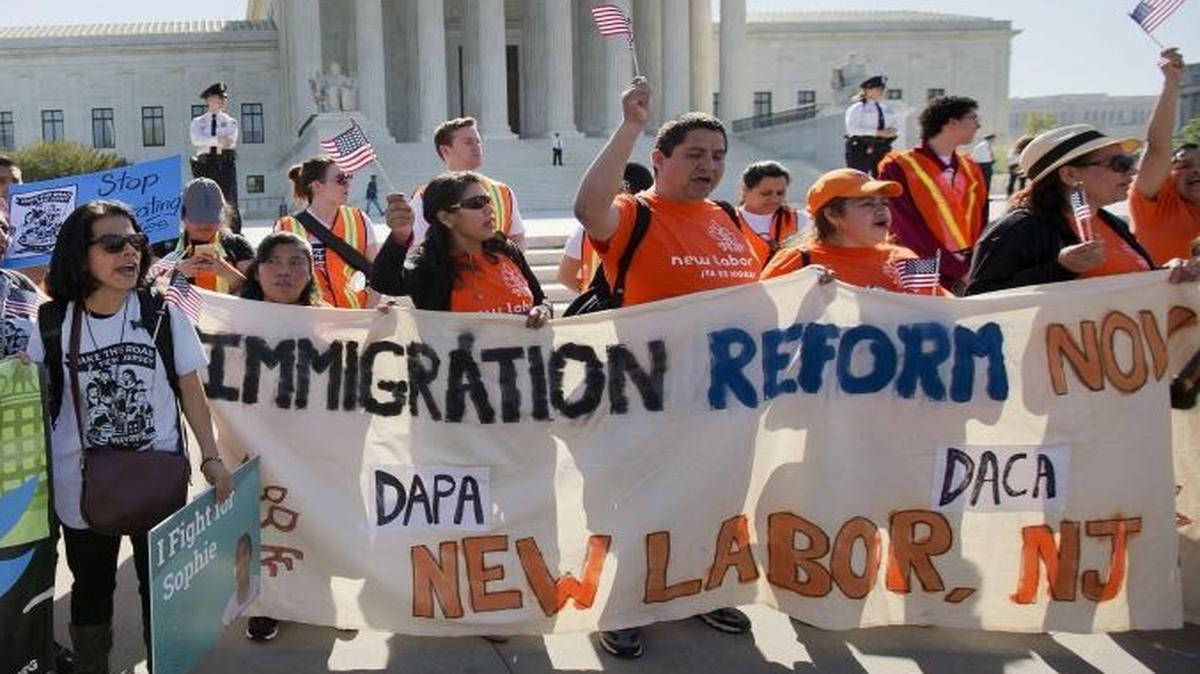 Supporters of immigration revisions gather in front of the Supreme Court in Washington on April 18, 2016.