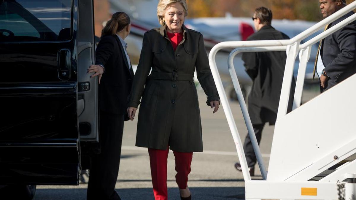 Was there a political motivation behind the surfacing of the latest batch of Democratic presidential candidate Hillary Clinton emails? Here, she boards her campaign plane at Westchester County Airport in White Plains, N.Y., Monday, Oct. 31, 2016.