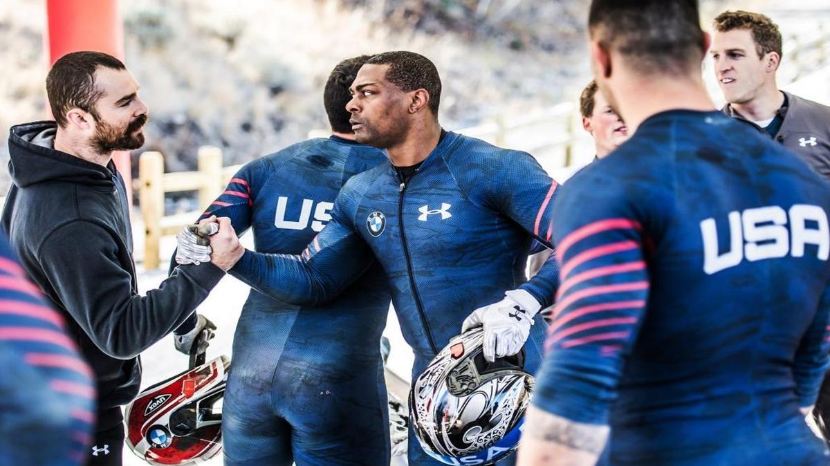 Adrian Adams, right, shakes hands with Carlo Valdes of Team USA Bobsled during team trials in Park City, Utah, on Nov. 3, 2016.