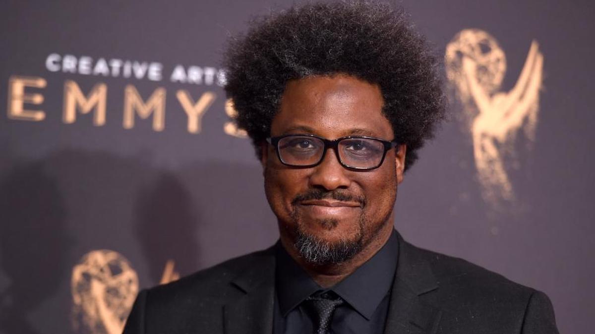 W. Kamau Bell arrives at night for one of the Creative Arts Emmy Awards at the Microsoft Theater in Los Angeles.