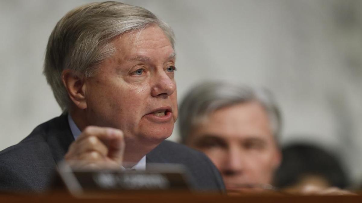 Senate Judiciary subcommittee on Crime and Terrorism Chairman Sen. Lindsey Graham, R-S.C., questions former acting Attorney General Sally Yates, and former National Intelligence Director James Clapper, on Capitol Hill in Washington, Monday, May 8, 2017, during the subcommittee's on Crime and Terrorism hearing: "Russian Interference in the 2016 United States Election." Committee ranking member Sen. Sheldon Whitehouse, D-R.I., listens at right.