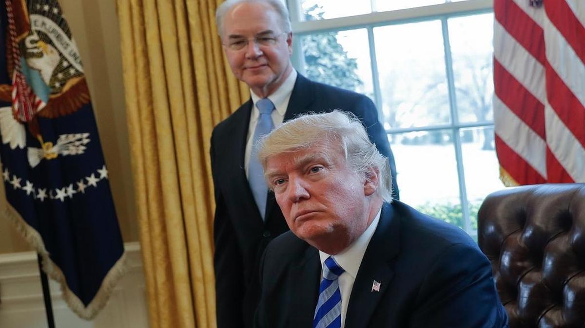 In this March 24, 2017, file photo, President Donald Trump and Health and Human Services Secretary Tom Price in the Oval Office of the White House on March 24. Trump’s budget proposal due for release on Tuesday reportedly calls for steep cuts to Medicaid and other social service programs.