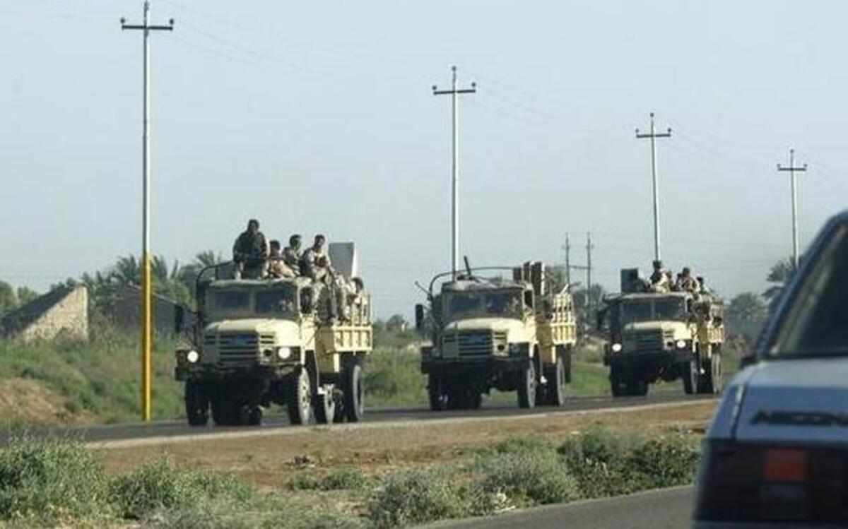 A convoy of Iraqi army vehicles driving out of Hawija, Iraq, in 2013.