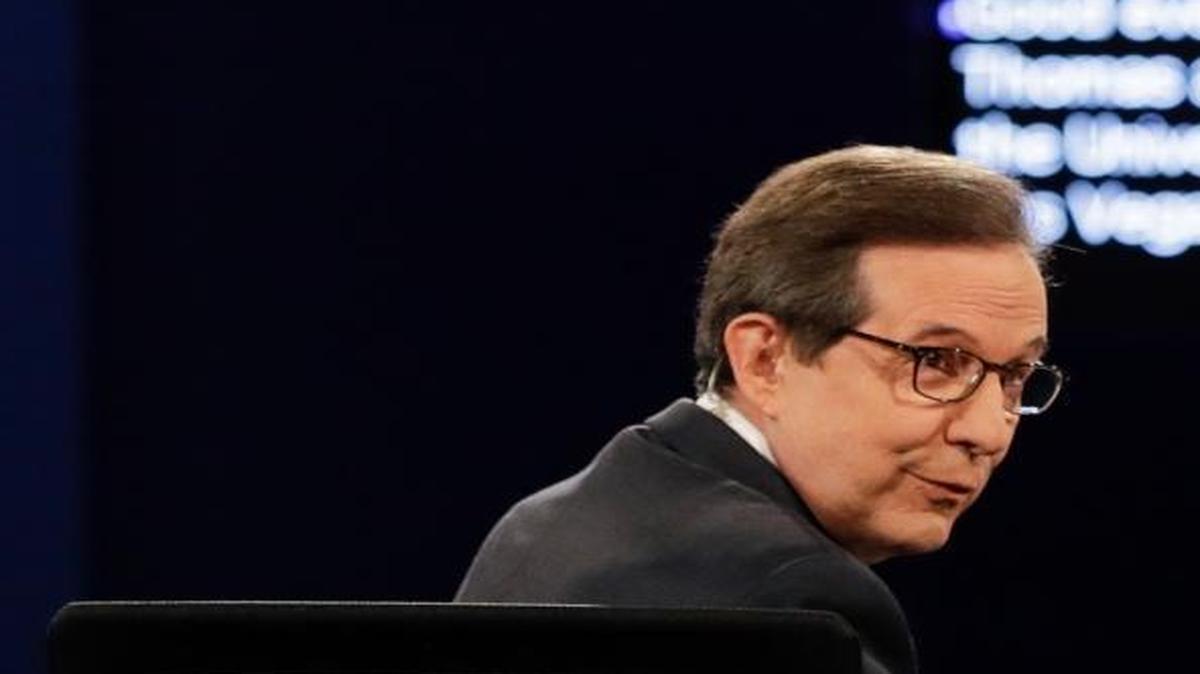 Moderator Chris Wallace of Fox News looks back at the audience before the third presidential debate at the University of Nevada, Las Vegas, Wednesday, Oct. 19, 2016.