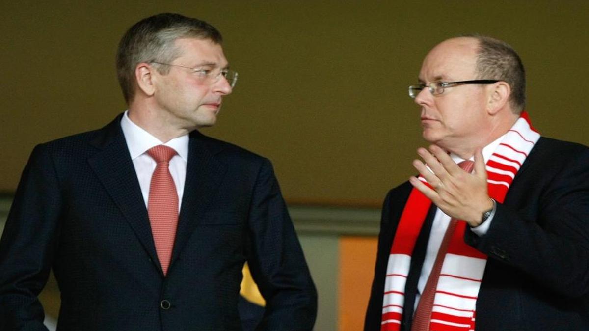 Monaco's soccer club president Dmitri Rybolovlev, left, speaks with Prince Albert II of Monaco during the Champions League Group C soccer match between Monaco and Bayer Leverkusen at Louis II stadium in Monaco, Sept. 16, 2014. In 2010, Rybolovlev was at the center of a global asset hunt in one of the world’s bitterest divorces. His then-wife, Elena, accused her estranged husband — now ranked by Forbes as Russia’s 14th richest man — of using offshore tactics to conceal his wealth. A recently leaked trove of documents, from an international law firm, suggest it happens quite a lot.