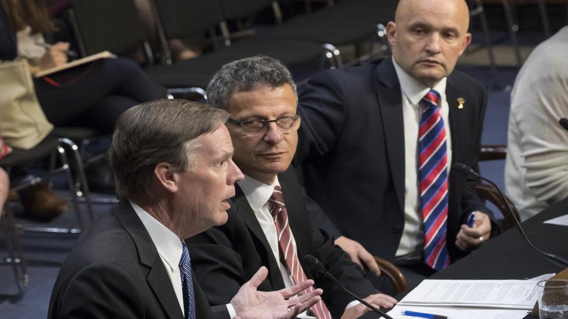From left, former Ambassador Nicholas Burns; Janis Sarts, director of the NATO Strategic Communication Center of Excellence; and Vesko Garcevic of Boston University, testify on Capitol Hill in Washington, Wednesday, June 28, 2017, as the Senate Intelligence Committee conducts a hearing on Russian intervention in European elections.