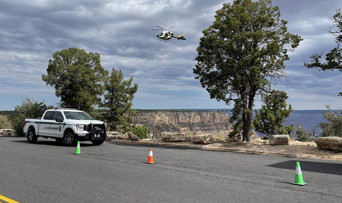 This photo shows rangers at the viewpoint where her body was found.