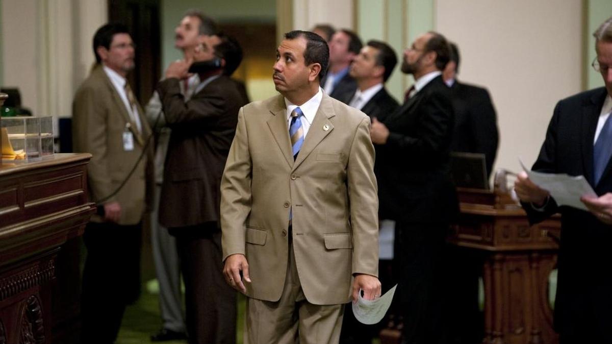 Then-Assemblyman Tony Mendoza looks at the vote tally on the Assembly floor on February 11, 2010.