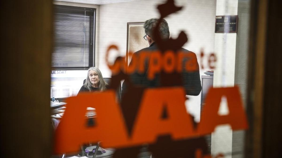McClatchy Washington Bureau reporter Kevin G. Hall, right, talks with registered agent Linda Grayson in the office suite of AAA Corporate Services in the Deming Building in downtown Cheyenne, Wyo., on March 8, 2016. Wyoming is the least populous and the second least densely populated of the 50 United States but a very popular location for the formation of offshore corporations, because with the help of a registered agent one can set up a LLC in Wyoming without one's name having to be in the State Register.