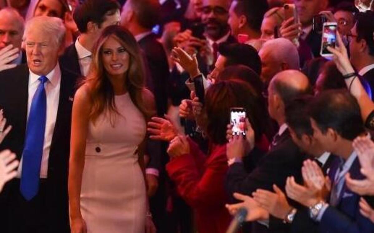 Donald Trump arrives with wife Melania to address the media at Trump Tower in New York after Tuesday's big victory in Indiana. "Who would have thought that I'd be here and we'd be waiting for Hillary?" Trump said, referring to Hillary Clinton's unfinished primary fight.
