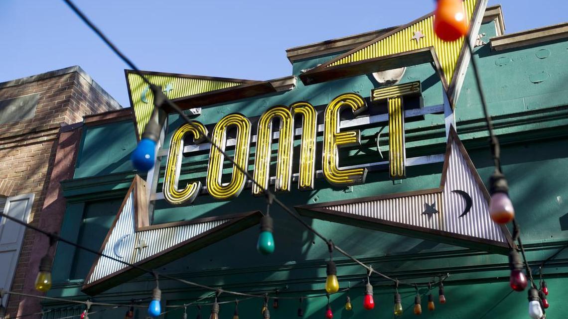 In this Dec. 5, 2016, photo, the front door of Comet Ping Pong pizza shop, in Washington, Monday, Dec. 5, 2016. For conspiracy theorists, "pizzagate" didn't end when a man brought a gun to a Washington restaurant in a misguided attempt to rescue child sex slaves, instead, the shooting fired up further belief in the baseless claims. On blogs, YouTube channels and internet radio shows devoted to conspiracy theories, some see Edgar Maddison Welch’s as the latest “false flag.” That’s a term for a cover-up or distraction orchestrated by the government or other powerful figures.