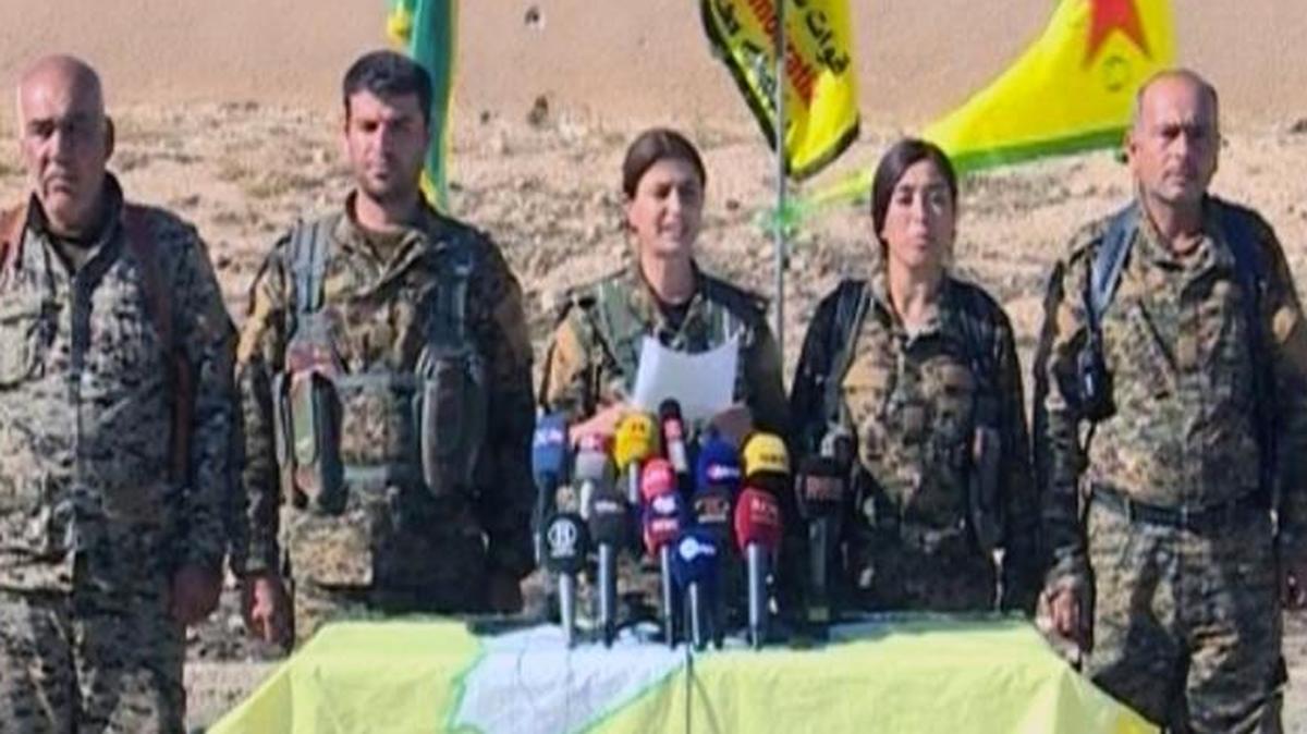 This frame grab from video provided by Arab 24 network, shows officials with the U.S.-backed Syria Democratic Forces at a press conference in Ein Issa in northern Syria. U.S.-backed Kurdish-led Syrian forces announced their plan Sunday to retake the Islamic State group's de facto capital of Raqqa.