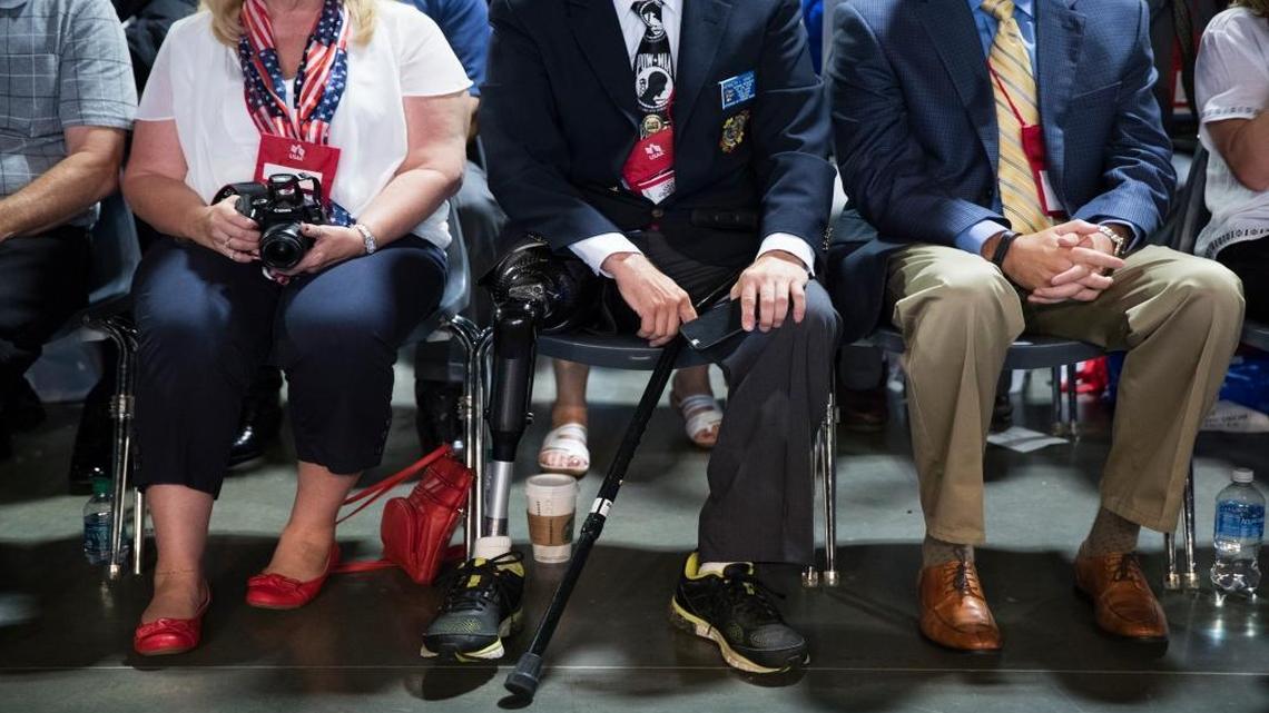 VFW members listen as Republican presidential candidate Donald Trump speaks during a Veterans of Foreign Wars convention in Charlotte, N.C., during the 2016 campaign.