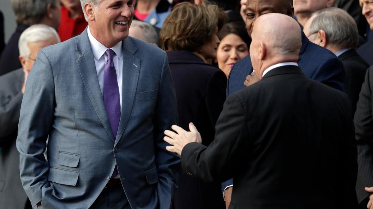 House Majority Leader Kevin McCarthy of Calif., left, and House Ways and Means Committee Chairman Kevin Brady, R-Texas, talk before President Donald Trump arrives an event after the passage of the "Tax Cut and Jobs Act Bill" on the South Lawn of the White House, Wednesday, Dec. 20, 2017, in Washington.