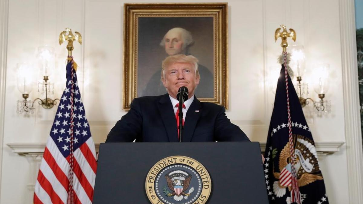 President Donald Trump pauses while speaking in the Diplomatic Reception Room of the White House in Washington, Monday, Aug. 14, 2017. Republican activists are rallying around his reponse to a white nationalist rally that has drawn widespread criticism.