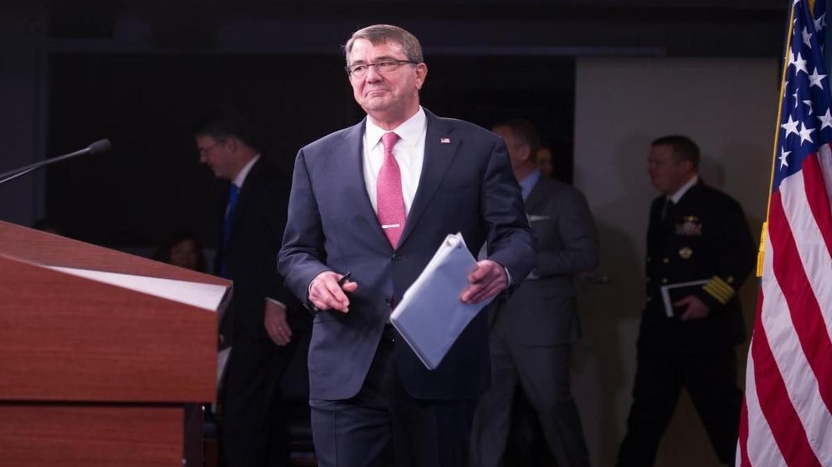 Defense Secretary Ash Carter arrives for a news conference at the Pentagon on Thursday, Dec. 3, 2015, to announce that he has ordered the military to open all combat jobs to women, and is giving the armed services until Jan. 1 to submit plans to make the historic change.