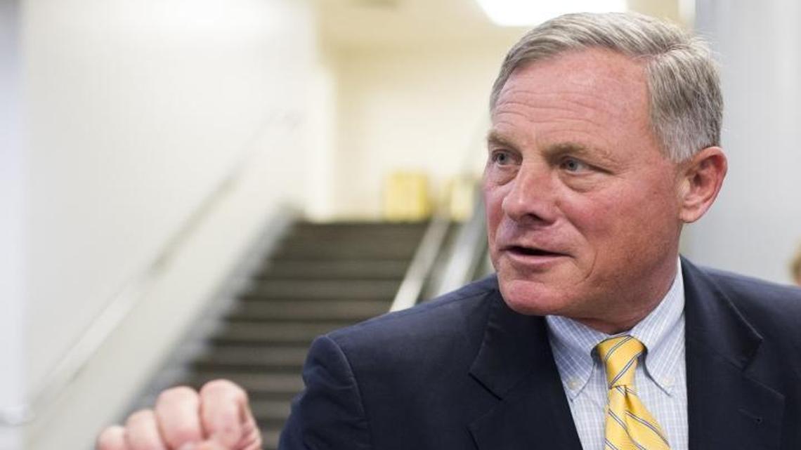 FILE – Sen. Richard Burr, R-N.C., speaks with a reporter on Thursday, Sept. 15, 2016 as he leaves the Capitol following a vote. On Monday, Burr said: “The Senate Select Committee on Intelligence has been, and remains, concerned about Russia’s actions.”