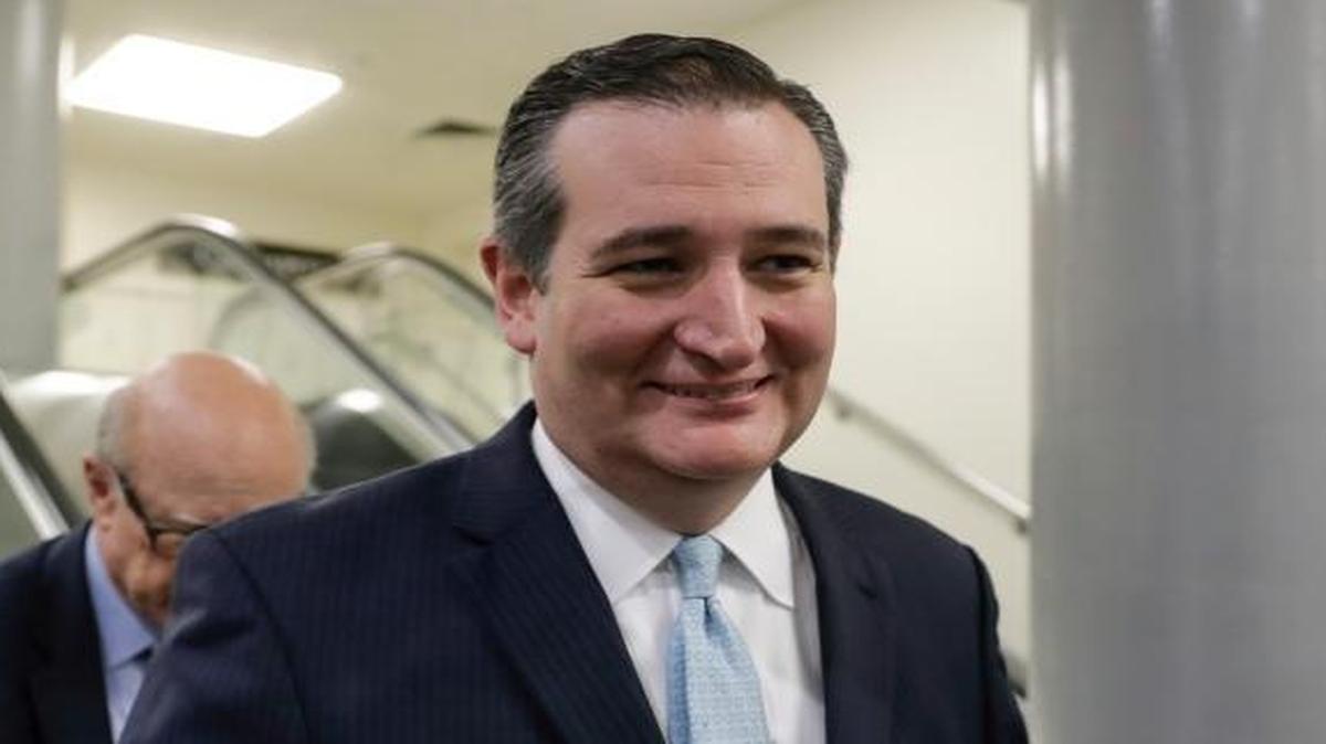 Sen. Ted Cruz, R-Texas, joined at rear by Sen. Pat Roberts, R-Kan., speaks with reporters after Senate Republicans released their long-awaited bill to scuttle much of President Barack Obama's Affordable Care Act, at the Capitol in Washington, Thursday, June 22, 2017.