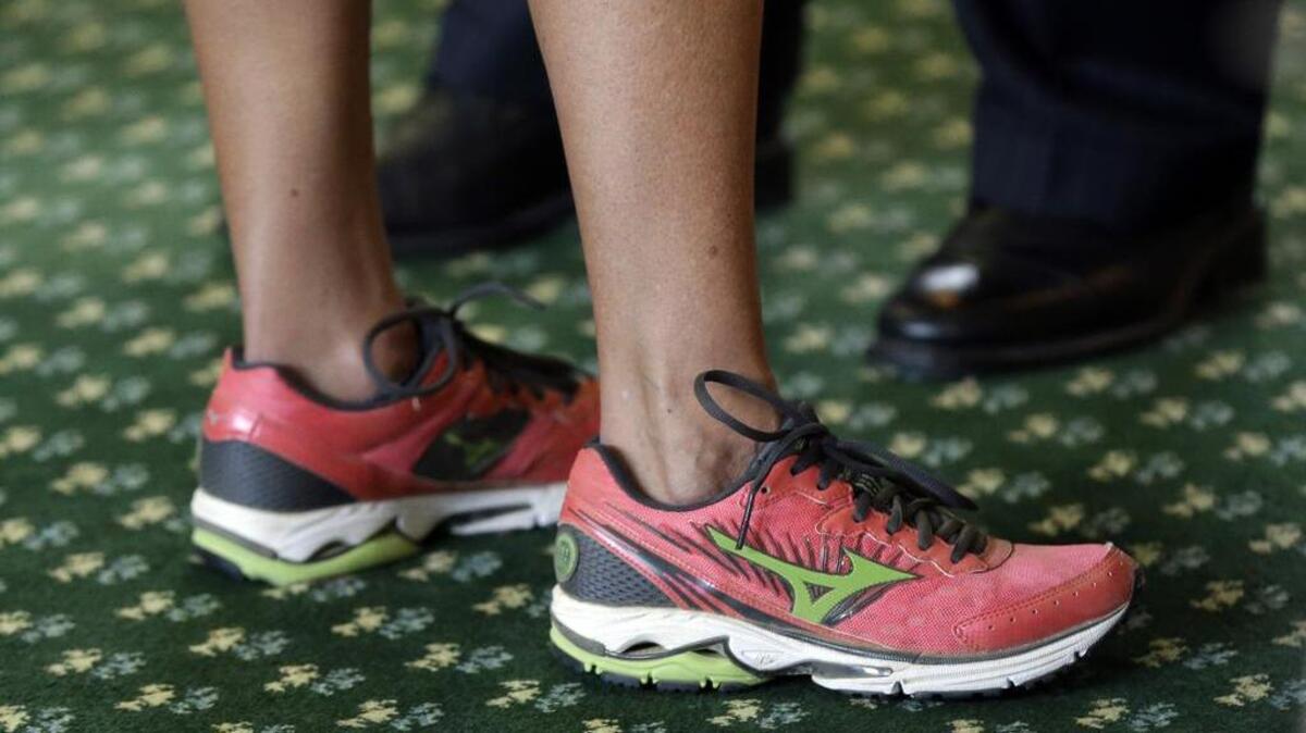 The rouge red Mizuno Wave Rider 16 running shoes that then-state Sen. Wendy Davis, D-Fort Worth, during a 2013 filibuster geared to kill an abortion bill continue to draw attention.