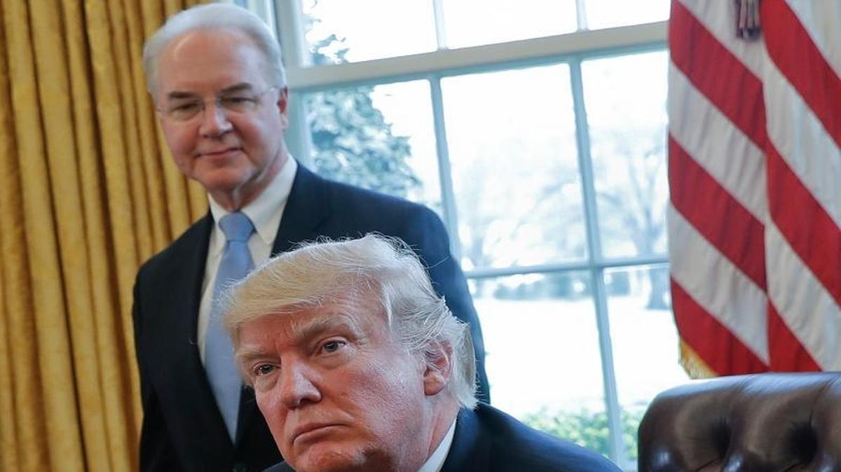 President Donald Trump with Health and Human Services Secretary Tom Price in the White House Oval Office last month. On Thursday, HHS finalized new rules designed to stabilize Obamacare insurance marketplaces. Critics say the rules favor insurers and weaken consumer protections.