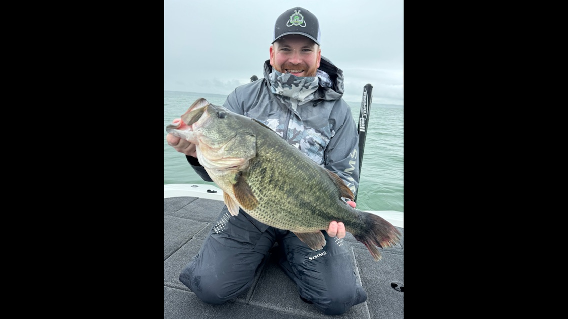 James Britenbaugh is seen holding his record-breaking largemouth bass.