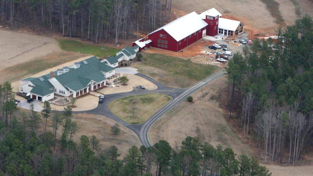 The home of John Edwards in Chapel Hill, seen in January 2007. The buildings include a gymnasium, a pool, a raquetball court and a 10,778 square foot main home.