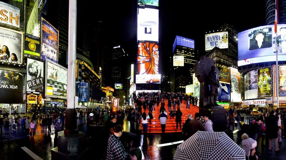 The unidentified man reportedly ran naked to the top of the red stairs in Times Square and jumped after officers tried to talk him down for an hour Thursday morning.