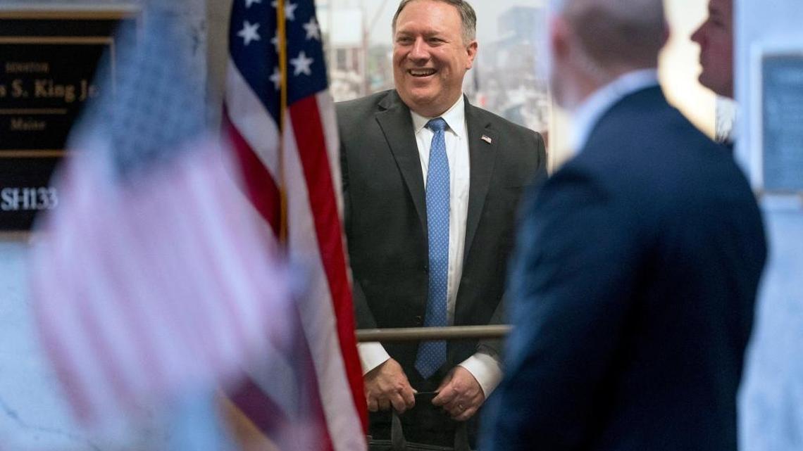 Secretary of State nominee Mike Pompeo leaves a meeting with Sen. Angus King, I-Maine, on Capitol Hill in Washington, Monday, April 9, 2018.