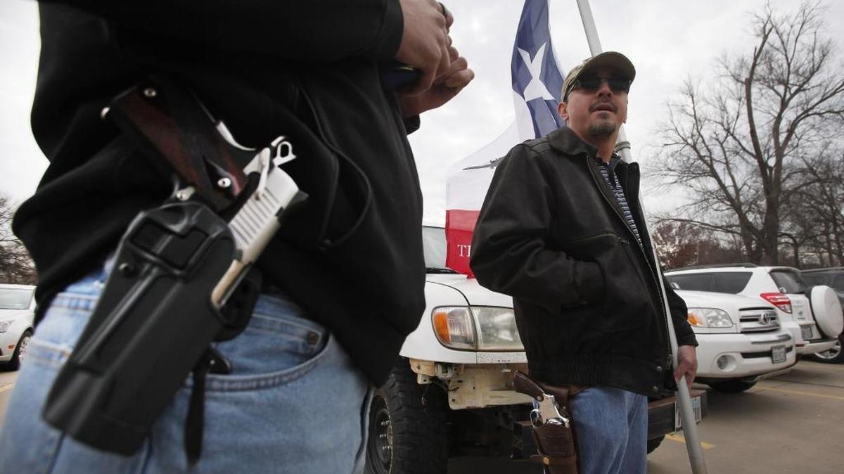 A group of Open Carry supporters gathered in Arlington on Jan. 1 to celebrate the new law by openly carrying their handguns.