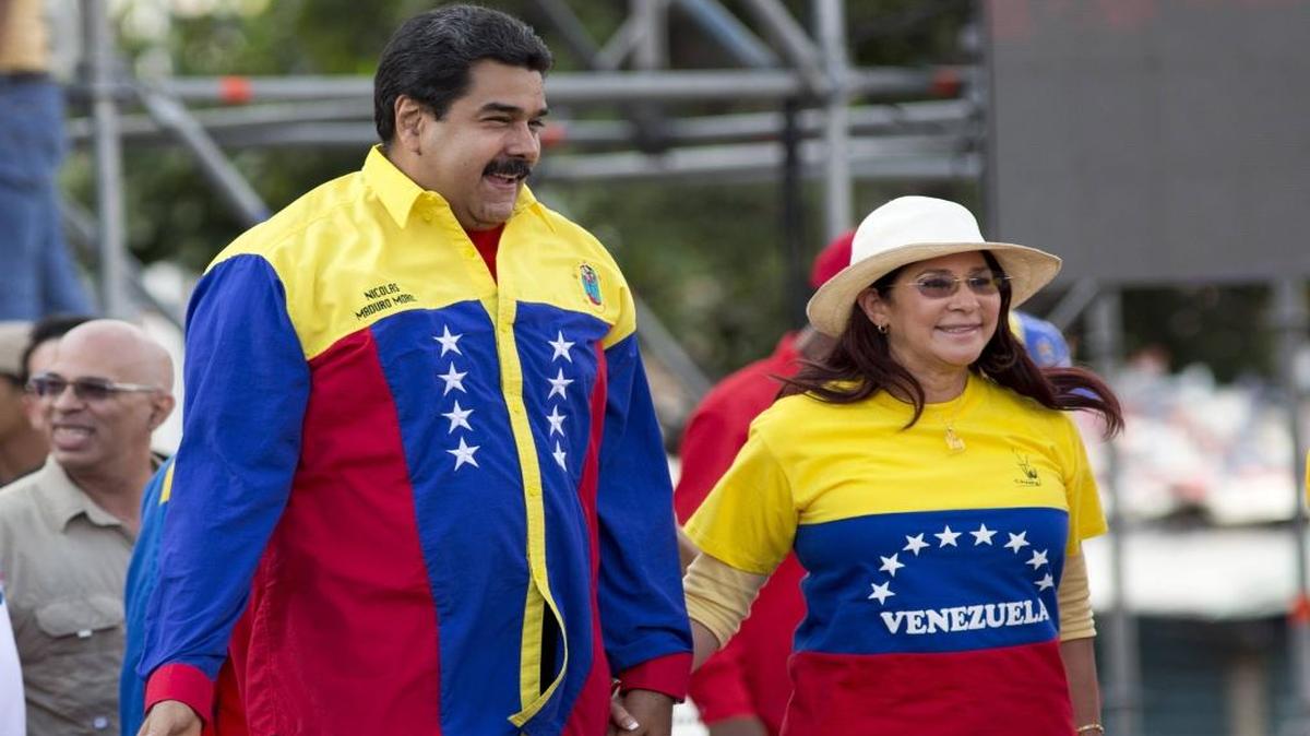 Venezuela's President Nicolas Maduro and first lady Cilia Flores during the closing campaign rally in Caracas, Venezuela, Dec. 3, 2015. Two of Flores nephews go on trial Monday for conspiring to smuggle hundreds of kilos of cocaine into the United States